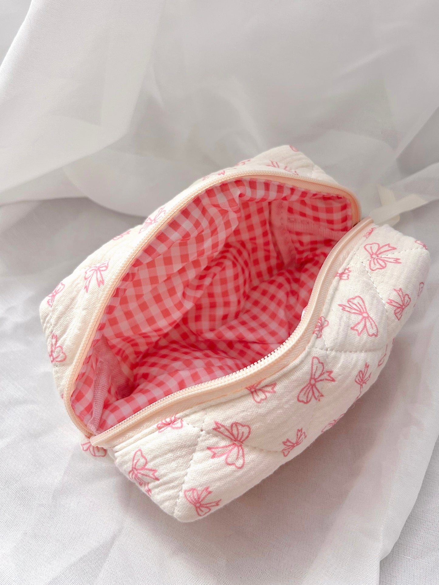Cream Bow Quilted Cosmetic Bag