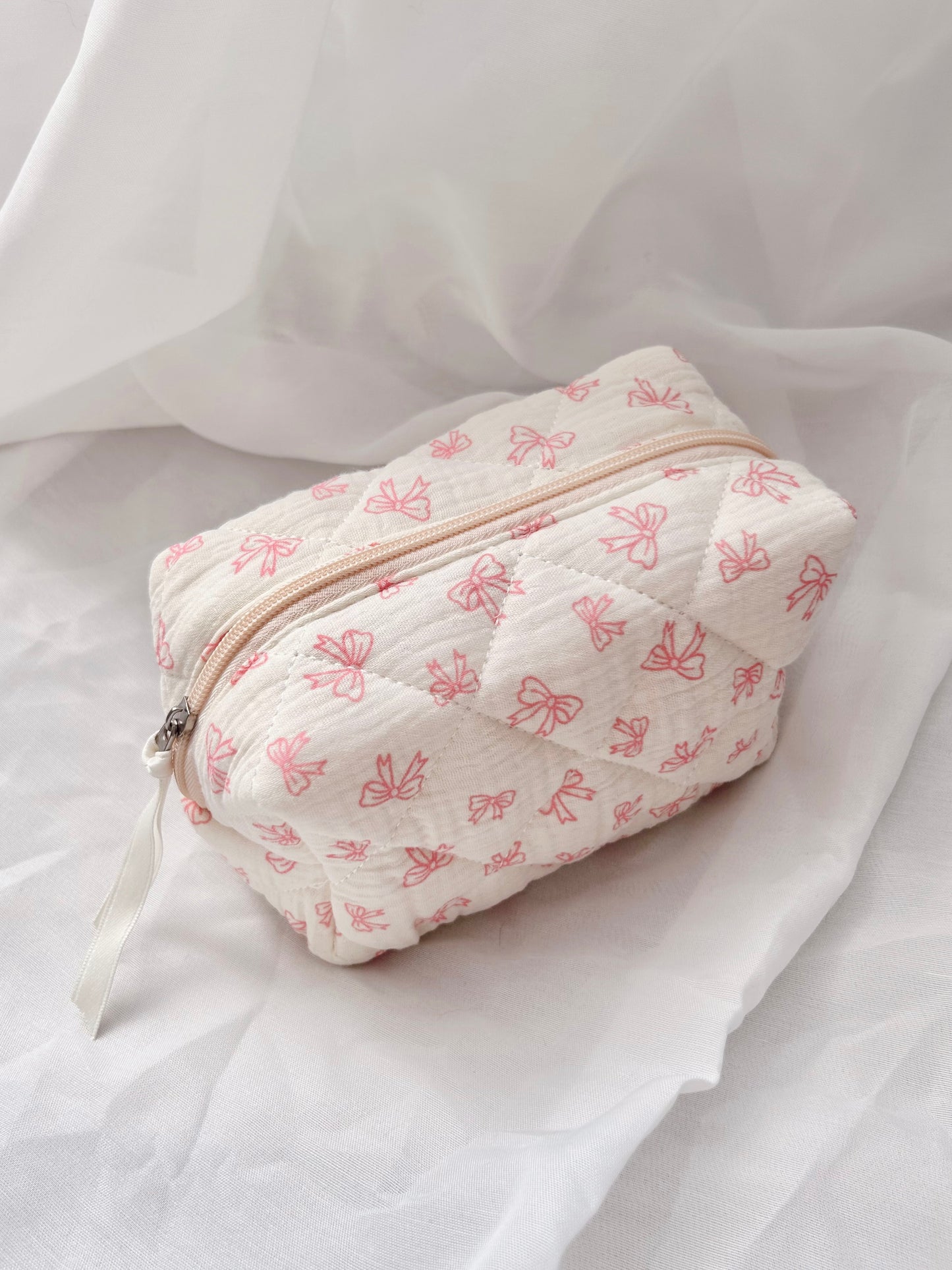 Cream Bow Quilted Cosmetic Bag