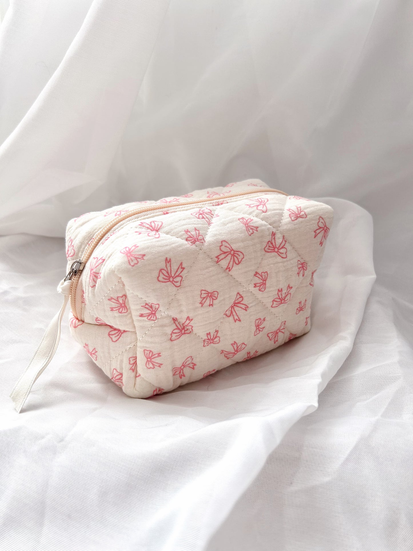 Cream Bow Quilted Cosmetic Bag